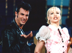 Giampiero Ingrassia in "Grease" con Lorella Cucccarini